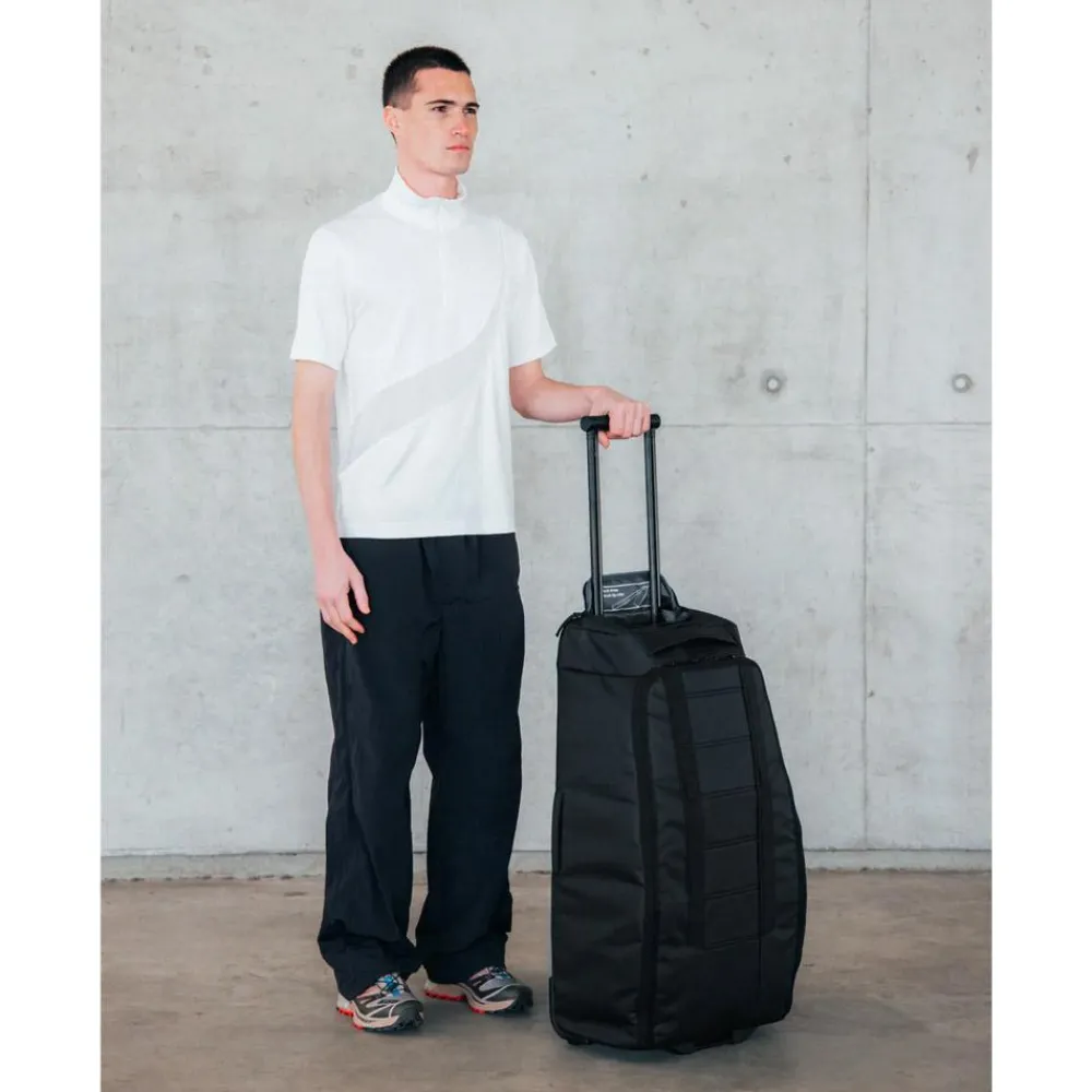 Online Valise Hugger Roller Bag Check-in 60L Black Out Sac De Voyage